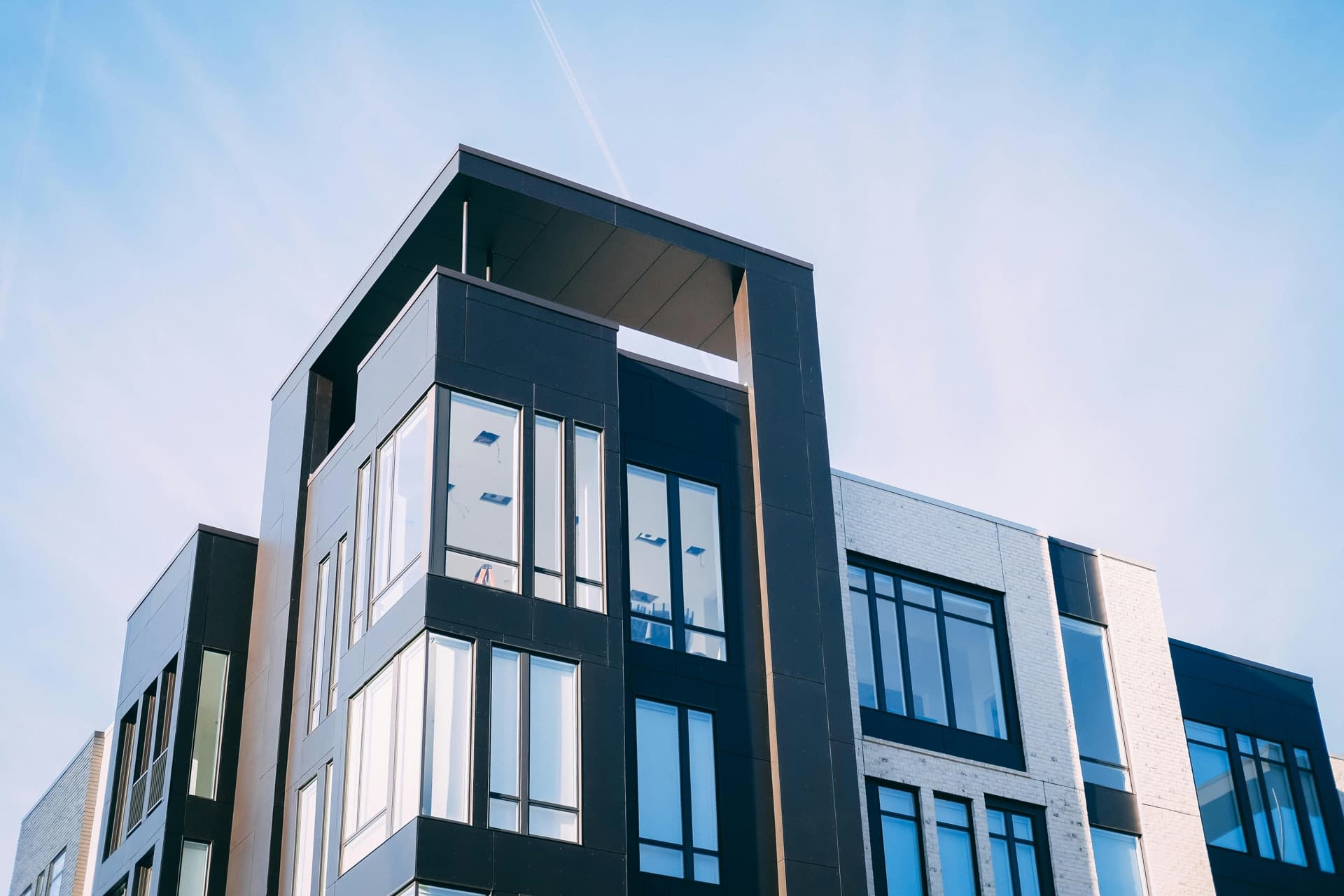 A modern apartment block at dusk